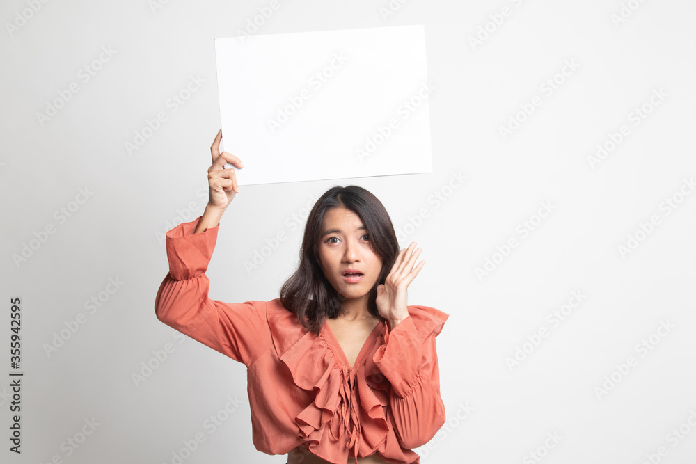 Young Asian woman surprise with white blank sign . Young Asian woman surprise with white blank sign .