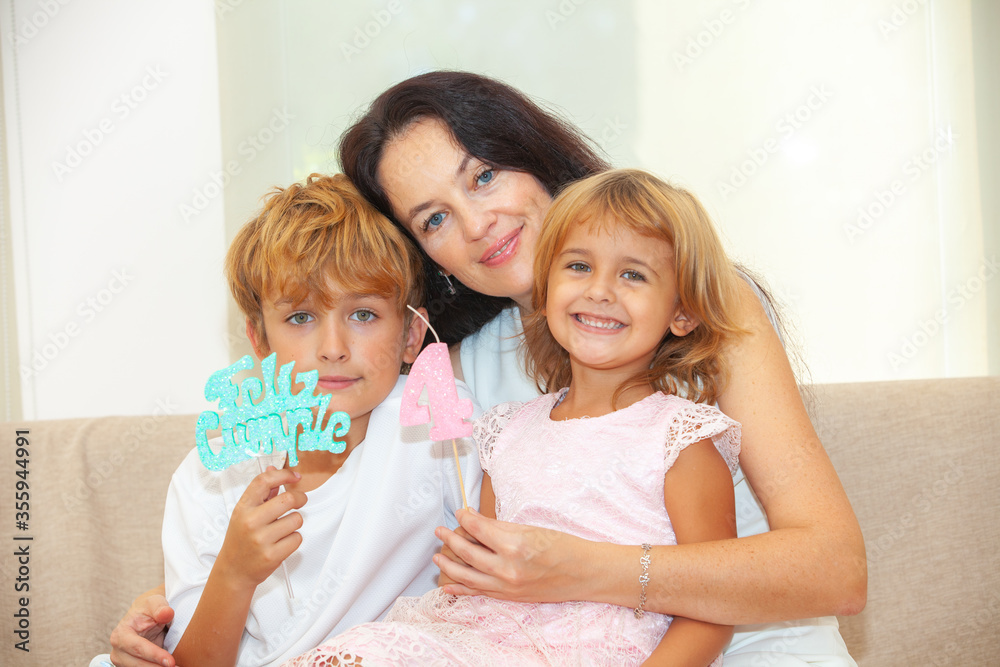 happy mother with kids on birthday happy mother with kids on birthday
