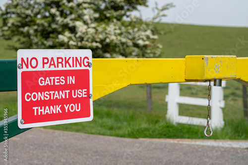 No Parking Gates In Constant Use Sign