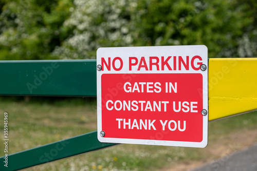 No Parking Gates In Constant Use Sign