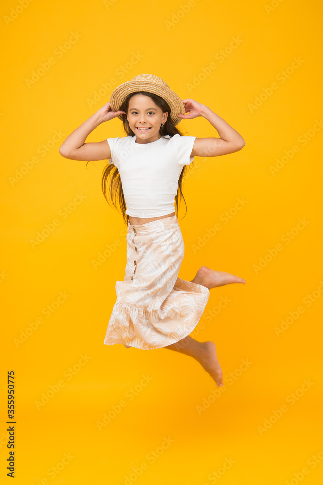 move your life. kid summer beach party. happiness in motion. celebrating beginning of summer holiday. happy vacation time. small girl in hat. fashion and beauty. fashion child enjoying summer day move your life. kid summer beach party. happiness in motion. celebrating beginning of summer holiday. happy vacation time. small girl in hat. fashion and beauty. fashion child enjoying summer day