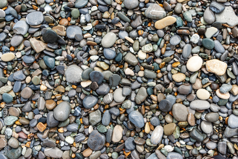 Tropical wet pebbles background. Loo beach, Tropical wet pebbles background. Loo beach,