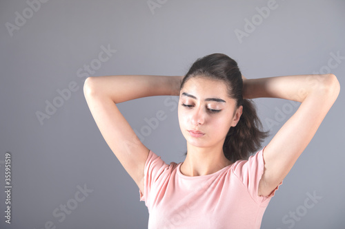 woman tie a tail hair