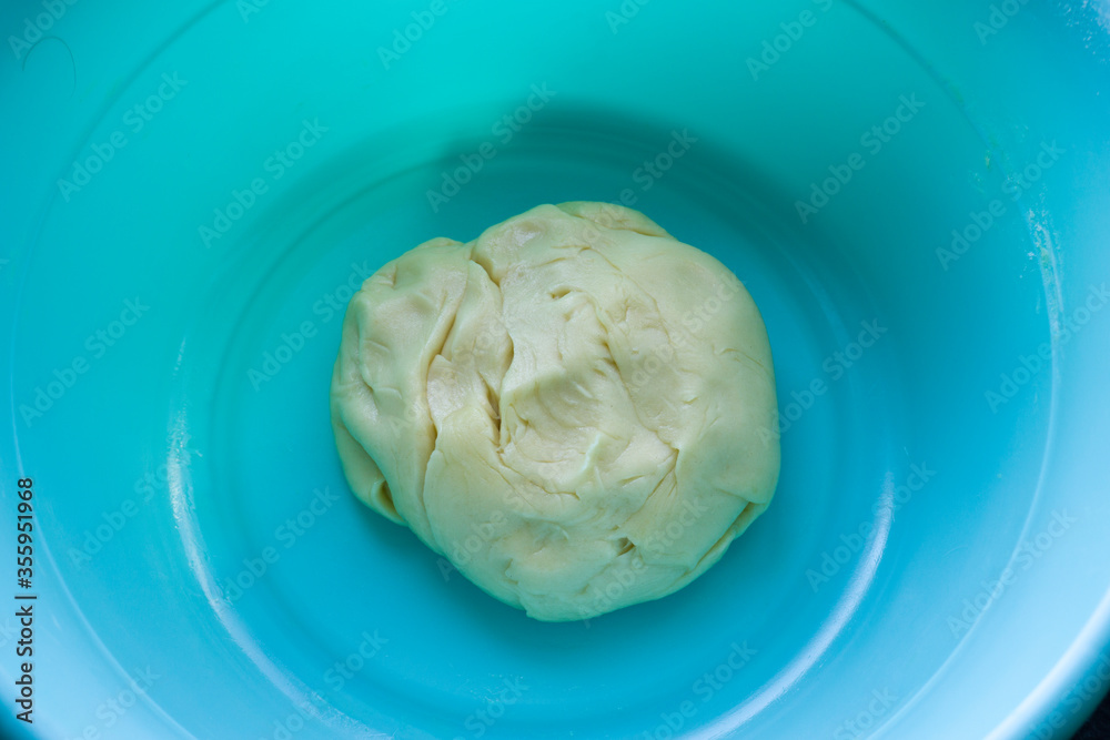 Bread dough in pot are ready for cooking process. Unhealthy lifestyle