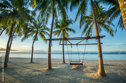 Chain lounge tropical swing in caribbean © Jan