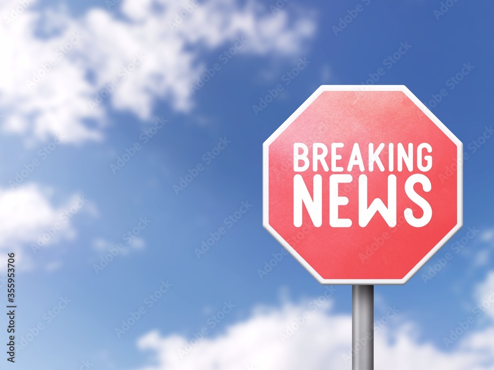 Breaking news - Road sign on blue sky background Breaking news - Road sign on blue sky background