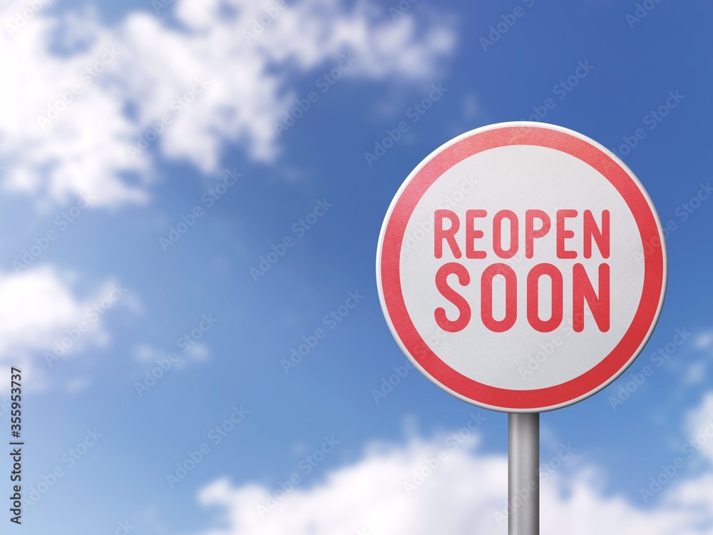 Reopen soon - Road sign on blue sky background Reopen soon - Road sign on blue sky background