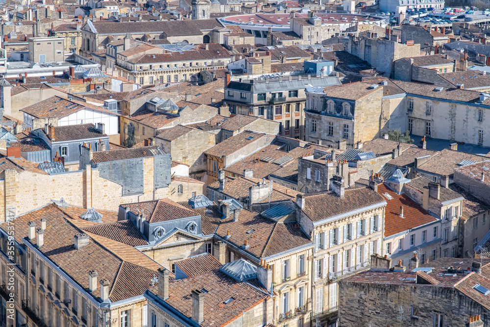 Bordeaux, beautiful french city, aerial view of tiles roofs
