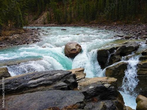 rock in waterfall