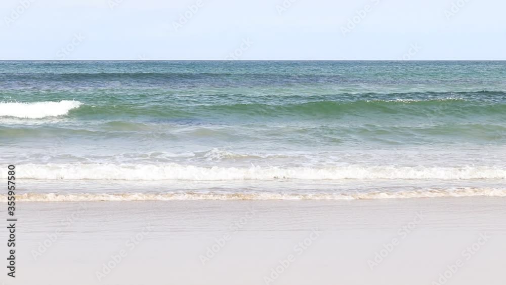 Clean fresh white tipped waves roll on to the the golden sand at Fraserburgh beach in Scotland. Nice and simple, just sand, sea and sky in natural colours. Clean fresh white tipped waves roll on to the the golden sand at Fraserburgh beach in Scotland. Nice and simple, just sand, sea and sky in natural colours.