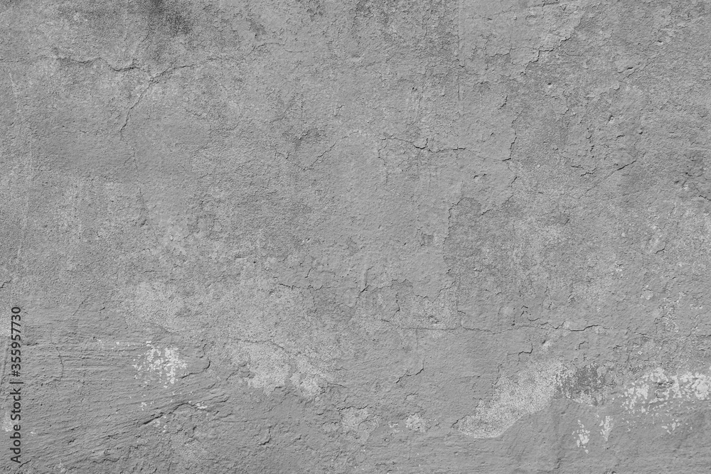 Fototapeta premium Texture of old gray concrete wall with cracks and attritions. Grunge cement background.