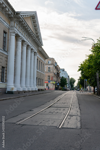 Kyiv (Kiev), Ukraine - June 07, 2020: The end of the tramway railing on the street, near the popular touristic place "Kontraktova Ploscha" Square © Bohdan