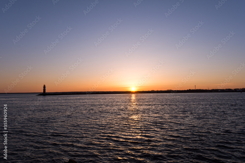 Lighthouse at Warnemünde Port While Sunrise, Rostock, Baltic Sea, Mecklenburg Western Pomerania, Germany, Europe