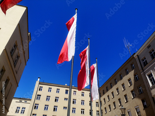 National flag of Poland on the cityscape