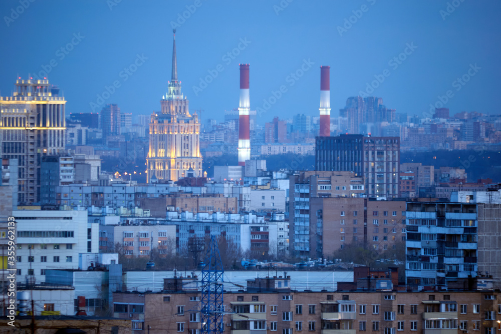 Fototapeta premium Moscow apartments at night. Hotel Ukraine. CHPP-12 - Moscow power station. Moscow. Russia.