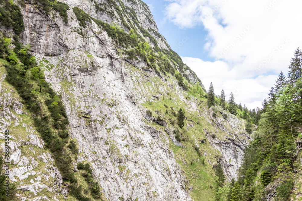 Primarily green rock landscape in the mountains