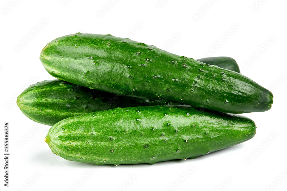 group of a fresh tasty cucumbers isolated on white background. group of a fresh tasty cucumbers isolated on white background.