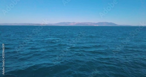 Reveal drone shot of Euvoia over the aegean sea in Greece. Shot in 4K