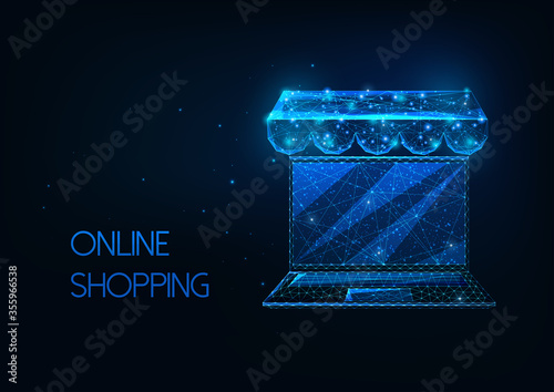 Futuristic online shopping concept with glowing low polygonal laptop