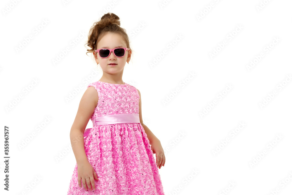 Little girl in sunglasses.Isolated on white background. Little girl in sunglasses.Isolated on white background.