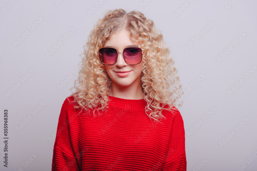 Smiling pretty girl with eye glasses model looking in to camera Smiling pretty girl with eye glasses model looking in to camera