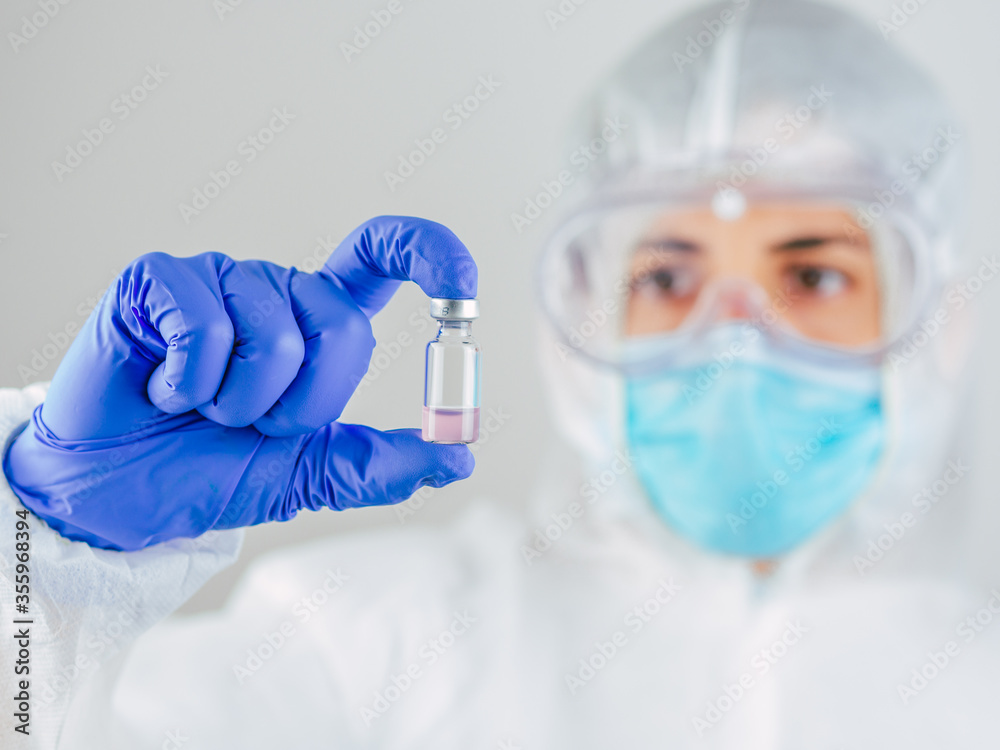 Doctor wearing face mask, protection glasses and PPE suit for Coronavirus. Doctor wearing face mask, protection glasses and PPE suit for Coronavirus.