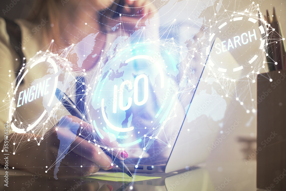 Double exposure of woman hands typing on computer and crypto market theme hologram drawing. Blockchain concept. Double exposure of woman hands typing on computer and crypto market theme hologram drawing. Blockchain concept.