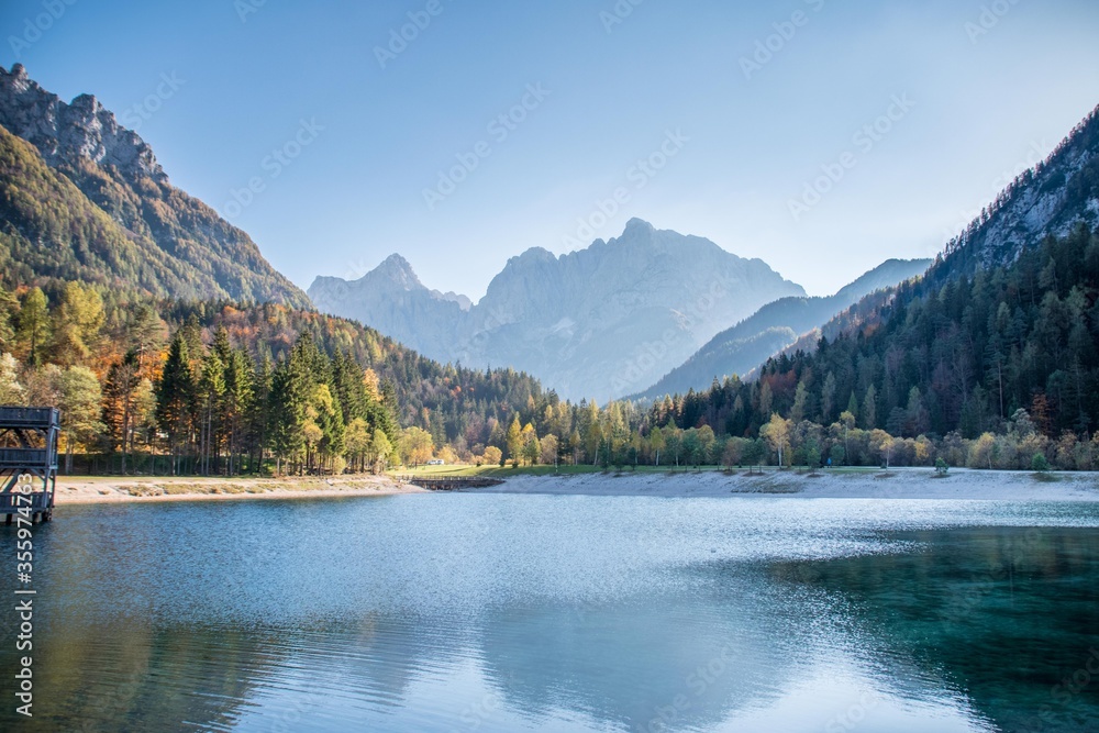 Calm day at Lake Jasna with Triglav mountains in the background in Slovenia