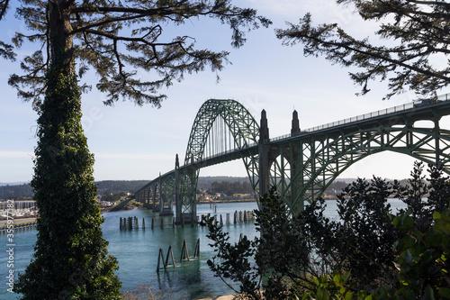 Yaquina Bay bridge in Oregon. Opened in 1936 on route 101 coast highway this stylized arch bridge passes over Yaquina Bay in Newport, Oregon  © Victoria