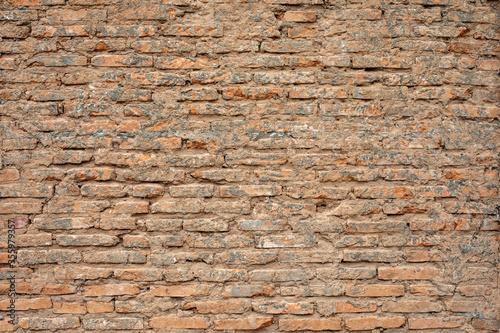 exposed brick wall or wall, with apparent mortar. Texture for backgrounds