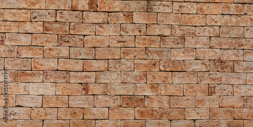 Exposed brick wall or wall, with apparent mortar. Texture for backgrounds
