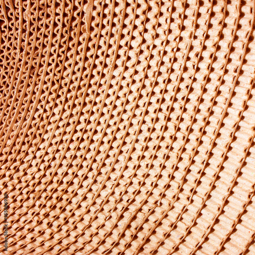 Brown corrugated cardboard useful as a background Brown corrugated cardboard useful as a background
