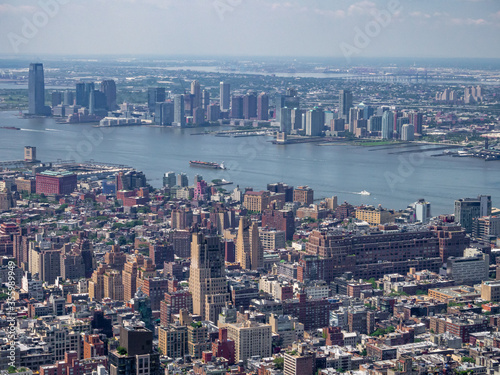 Fototapeta Naklejka Na Ścianę i Meble -  Manhattan midtown buildings and streets, Hudson River, Jersey City and New Jersey viewed from above