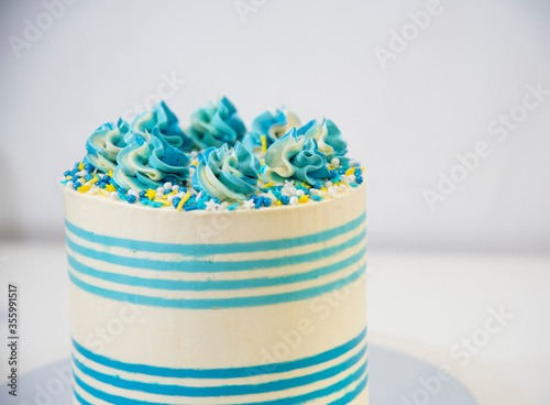 buttercream_cake_stripes_white_and_blue photo