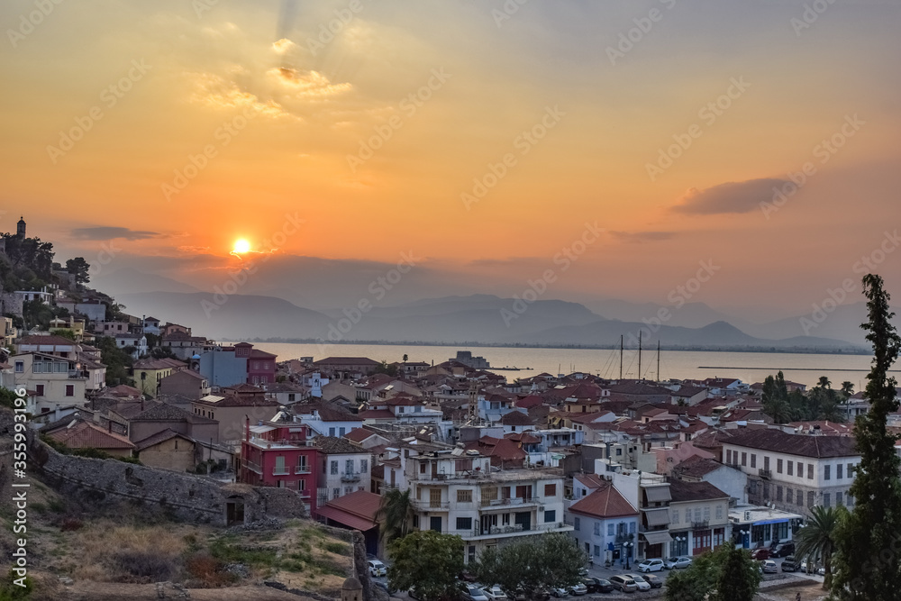 Greek old city Nafplion seen from above in a colorful evening sky sunset dramatic sky