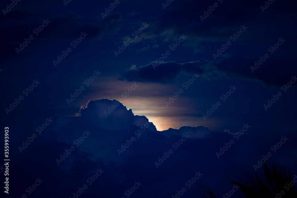 moon behind clouds moon behind clouds