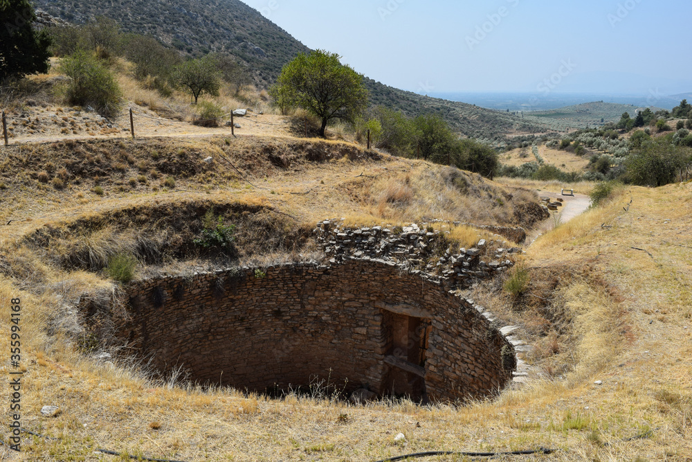 Remains of a big grave vault in Mycenae ancient historical archeological site. Remains of a big grave vault in Mycenae ancient historical archeological site.