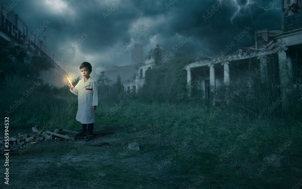 Scientist boy holding a syringe with the cure for the pandemic (Corona - Covid-19) in an apocalyptic scenario with destroyed buildings. Scientist boy holding a syringe with the cure for the pandemic (Corona - Covid-19) in an apocalyptic scenario with destroyed buildings.