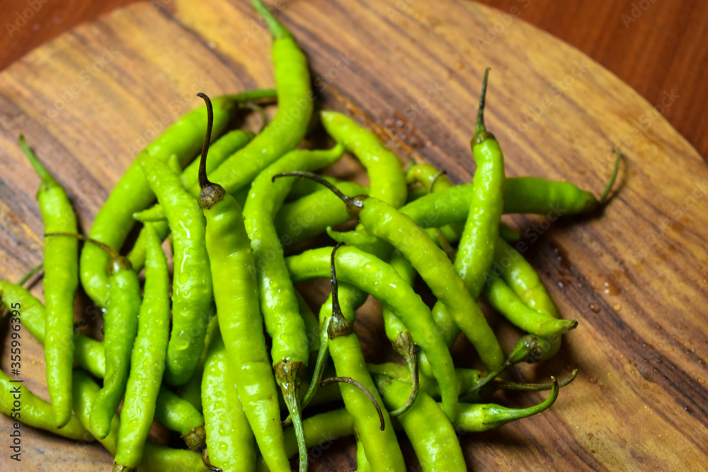 Fresh Green Chilies on Wooden Background top View Close-Up Stock Photograph Image Fresh Green Chilies on Wooden Background top View Close-Up Stock Photograph Image