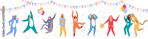 Pajama party. Happy people wearing animal costume onesies, celebrating holiday. Young men, women cartoon characters in kigurumi having fun at pajama party with garland, balloons and flying feathers photo