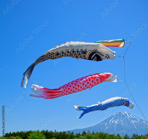 Colorful koinobori carp kites at the Asagiri Highlands near Mount Fuji in Japan. photo