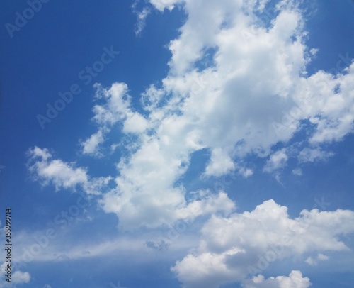 white fluffy cloud weather and blue sky outdoor