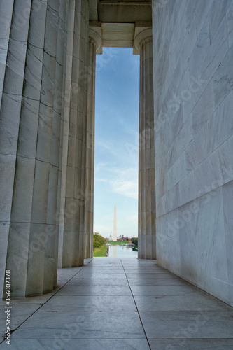 Lincoln Memorial s columns and the Washington Monument in Washington  D.C.