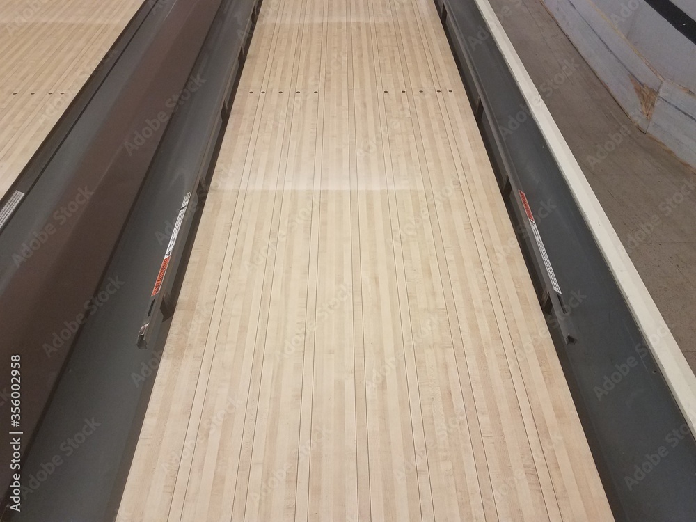 waxed wooden bowling alley lanes with bumpers Stock Photo Adobe Stock