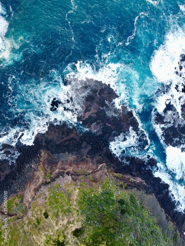 Aerial view of waves and island Australian landscape