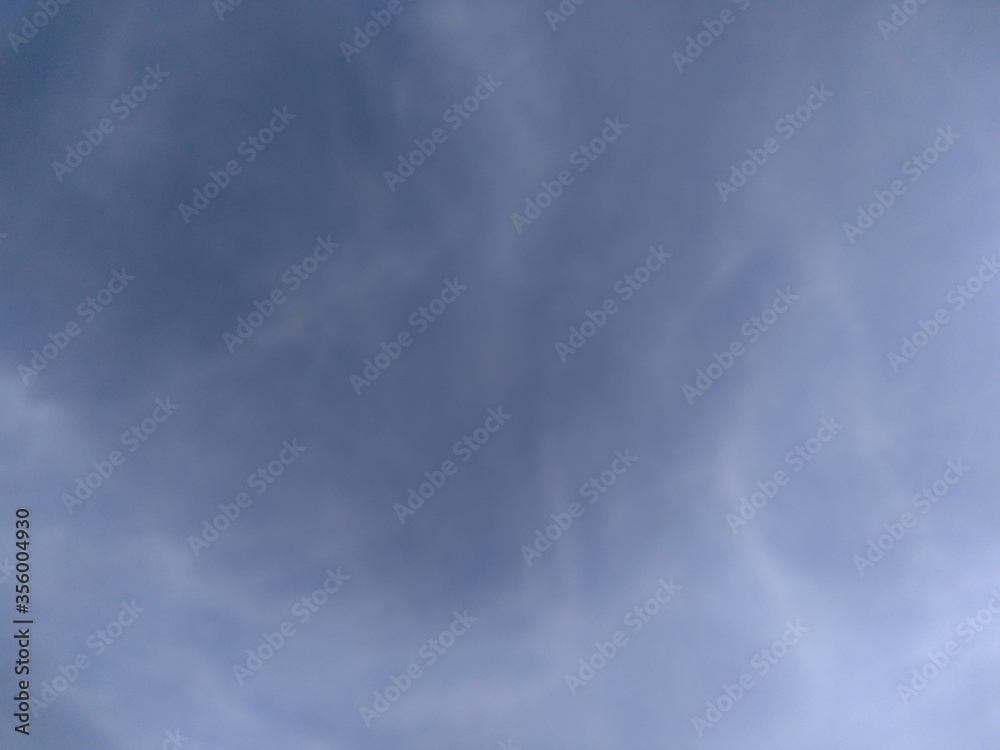 blue sky with clouds, blurred blue sky with clouds, blurred