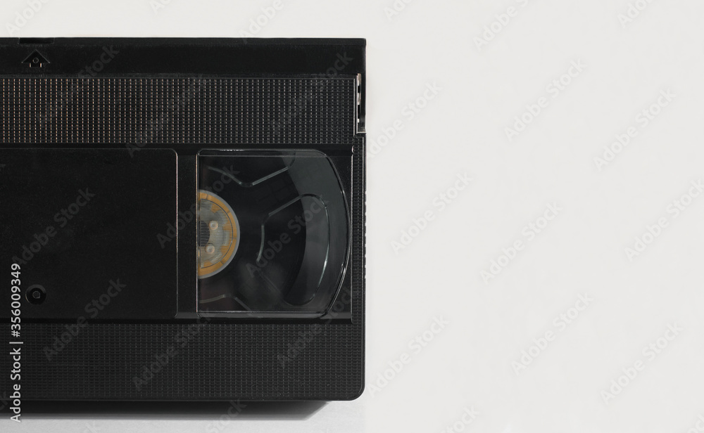 Obraz premium vhs video cassette on a pure white background. old film cassettes with video films. the age of video recorders