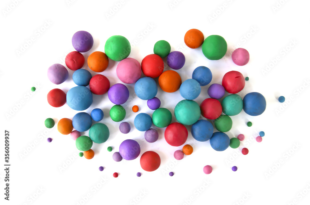 Abstract colorful plasticine balls isolated on white background. Many balls made of modeling clay,. Abstract colorful plasticine balls isolated on white background. Many balls made of modeling clay,.