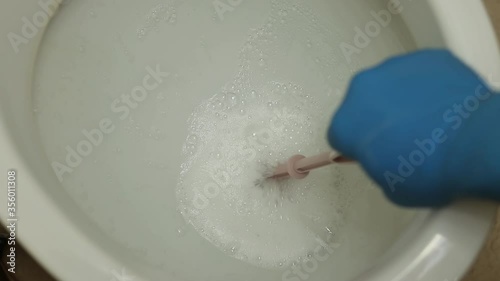 to clean a dirty toilet in the toilet room