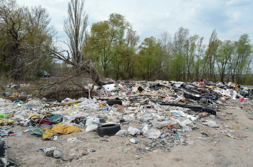 Spring landscape.Ecology of Ukraine. Nature near Ukrainian capital. Environmental contamination. Illegal junk dump. . Kiev,Ukraine Spring landscape.Ecology of Ukraine. Nature near Ukrainian capital. Environmental contamination. Illegal junk dump. . Kiev,Ukraine